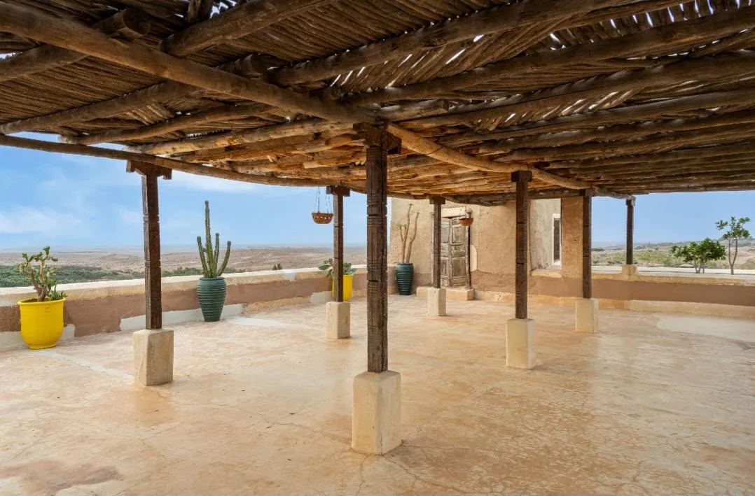 The covered rooftop terrace at Tigmi, looking out over the countryside
