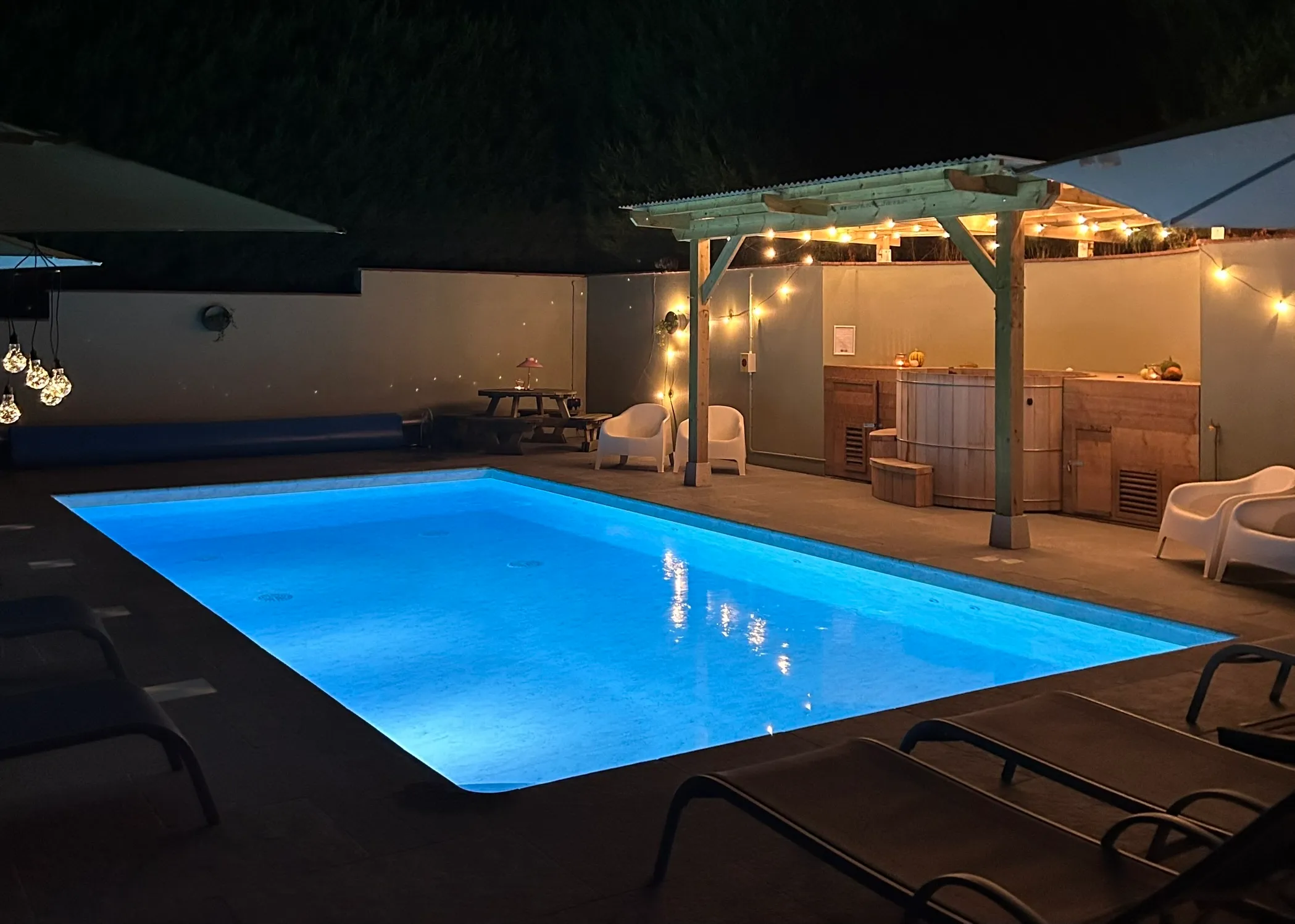 The pool at The Old Rectory, Kilve, lit up at night